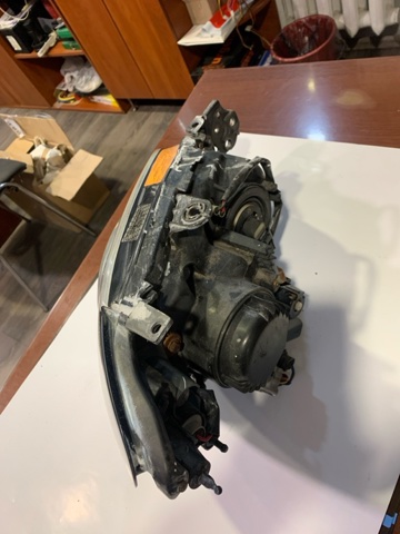 Фара левая 84001FE650 SUBARU