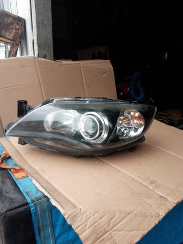 Фара 84001FG310 SUBARU