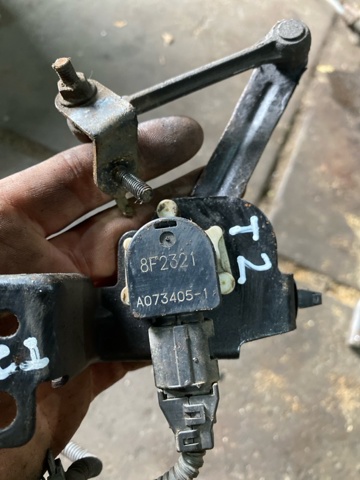 84021AG000 Датчик уровня положения кузова передний купить Киев