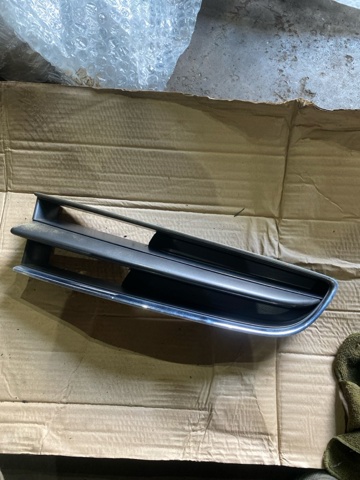 Решетка радиатора левая 91121XA22A SUBARU