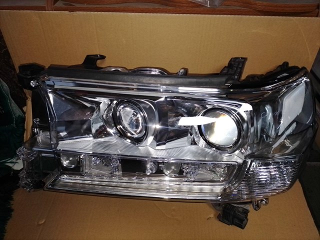 Вставка фары левой 8110660K12 TOYOTA