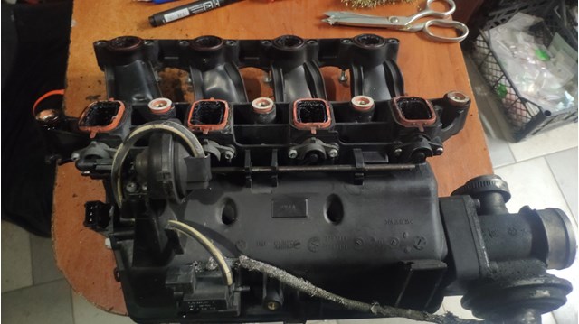 7787318 BMW Коллектор впускной купить в Украина