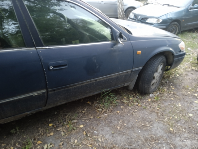 Пассажирская передняя дверь 6700133060 TOYOTA