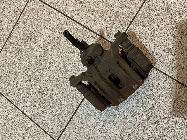 Тормозной суппорт правый задний 44001EB30A NISSAN