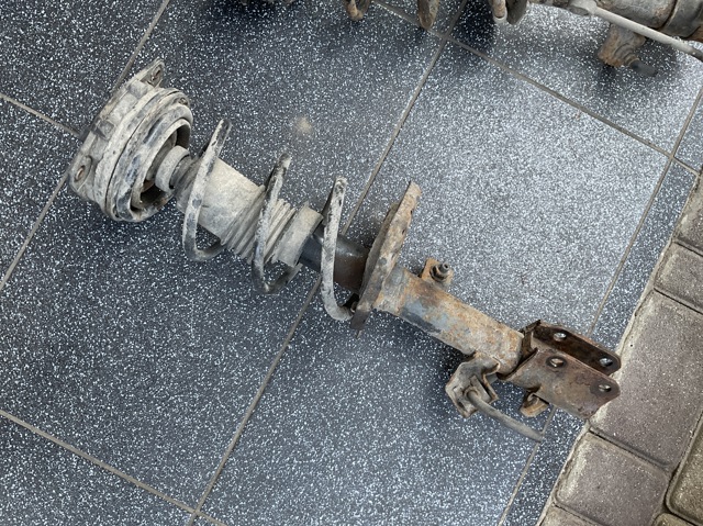 Амортизатор передней подвески левой 54303AX626 NISSAN