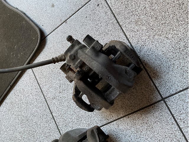 Суппорт тормозной левый задний A0024202783 MERCEDES