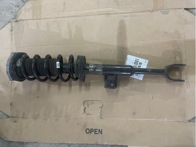 Амортизатор передней подвески левой 31316866599 BMW
