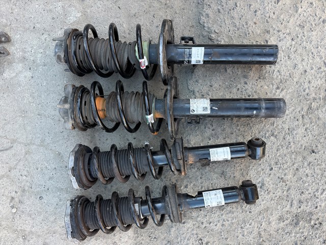 Амортизатор передний левый 31316871781 BMW