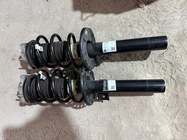 Амортизатор подвески передний левый 31316871792 BMW