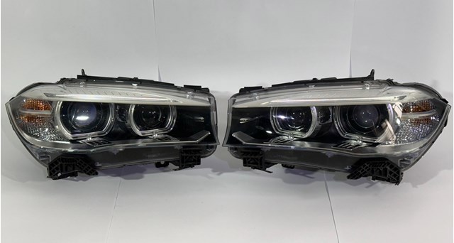 Вставка фары левой 63117317101 BMW