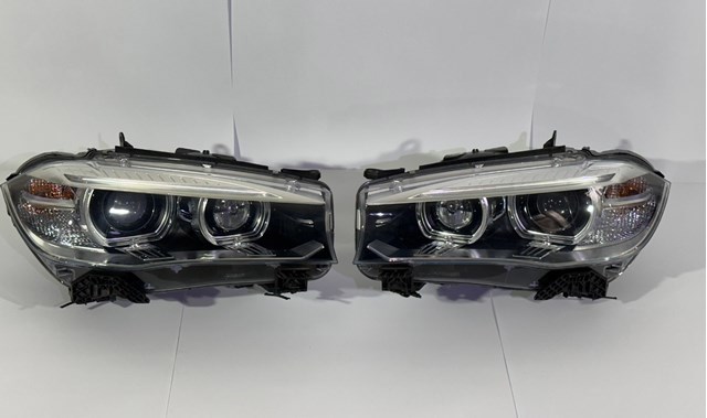 Вставка фары левой 63117317105 BMW