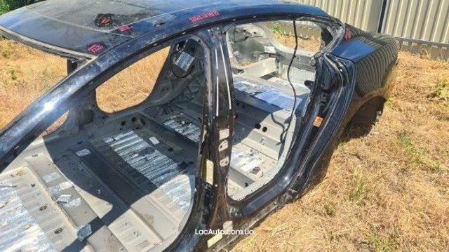 Стойка боковая 1024206S0B TESLA