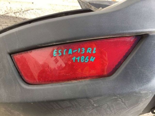 Катафот (отражатель) заднего бампера, левый CJ5Z15A449B FORD