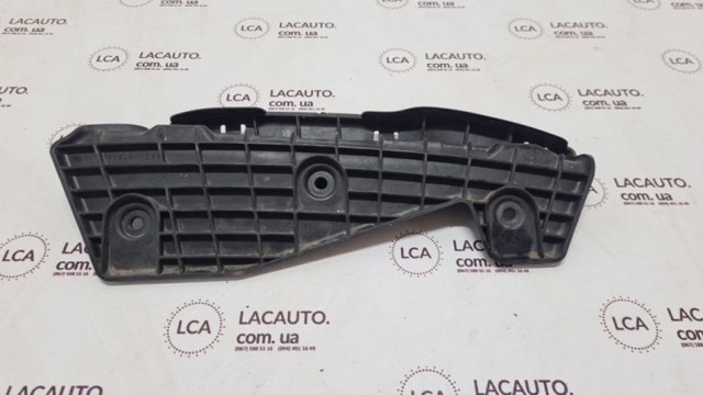 Кронштейн-адаптер крепления фары передней, левой CJ5Z17C973A FORD