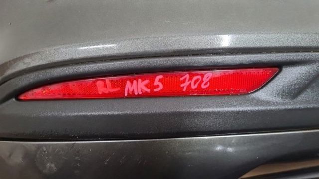 Катафот (отражатель) заднего бампера, левый DS7Z13A565K FORD