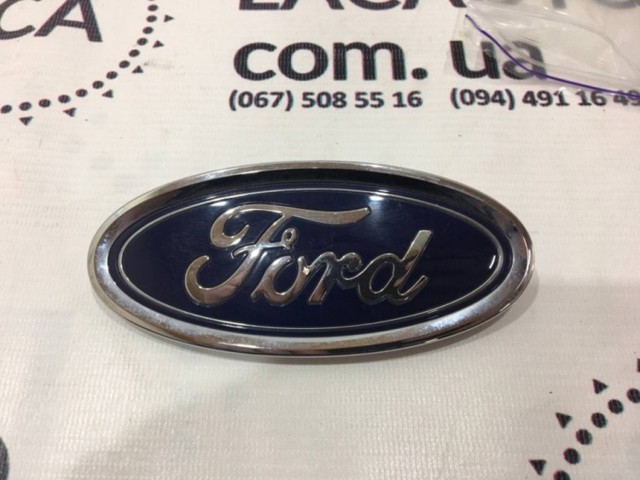 Фирменный значек на багажник DS7Z8213A FORD