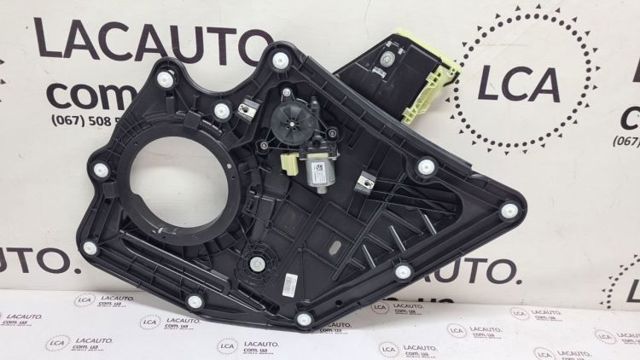 Моторчик стеклоподъемника двери задней, правой LJ6Z7827000A FORD