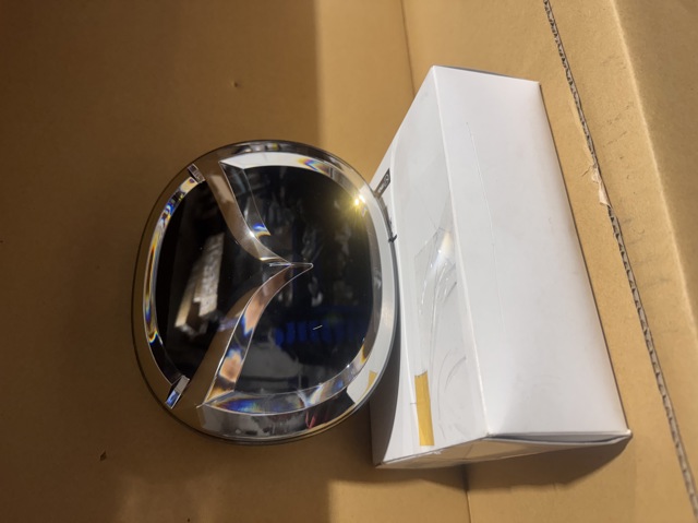 KBB3507Z0B MAZDA Эмблема решетки радиатора купить в Черновцы
