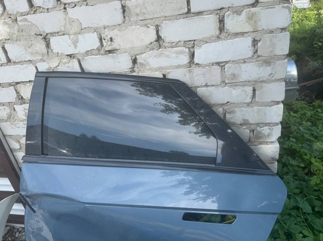 Стекло двери задней левой 83410GI030 HYUNDAI