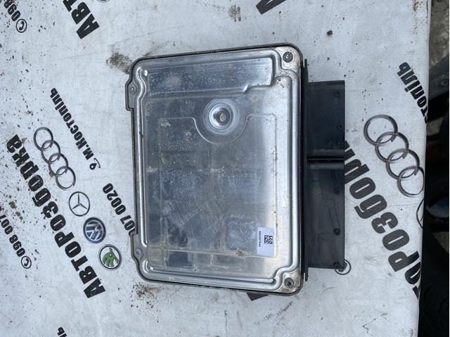 Электронный блок управления двигателем 03G906021QP VAG
