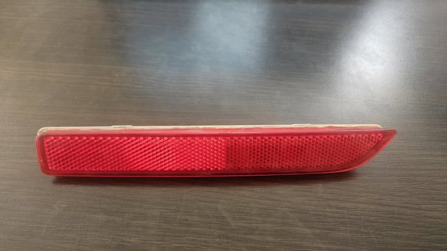 Отражатель бампера заднего правый 265608990B NISSAN