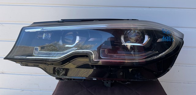Вставка фары левой 63118496155 BMW