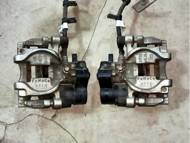 Задний правый суппорт DG9Z2552C FORD