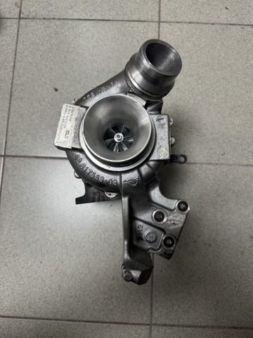 Турбокомпрессор 11658514664 BMW