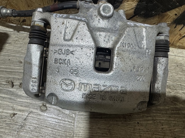 Суппорт тормозной передний правый BCYA3398ZB MAZDA