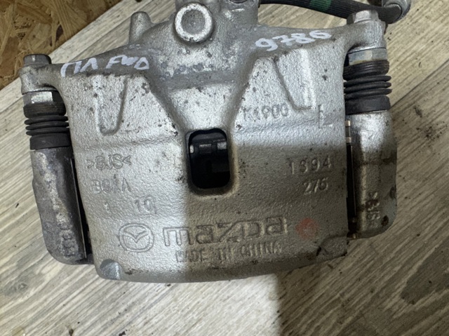 Суппорт тормозной, передний, левый BCYA3399ZB MAZDA