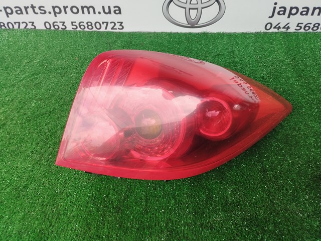 Фонарь задний левый 26555AU210 NISSAN