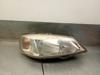 Luz direita 1216111 OPEL