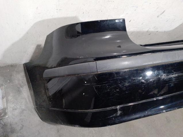 Pára-choque traseiro 12798001 General Motors