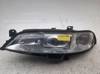 Luz esquerda 1307022293 OPEL