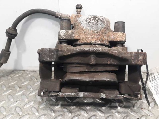 FORD 1583140 Суппорт тормозной передний левый в наличии Николаев