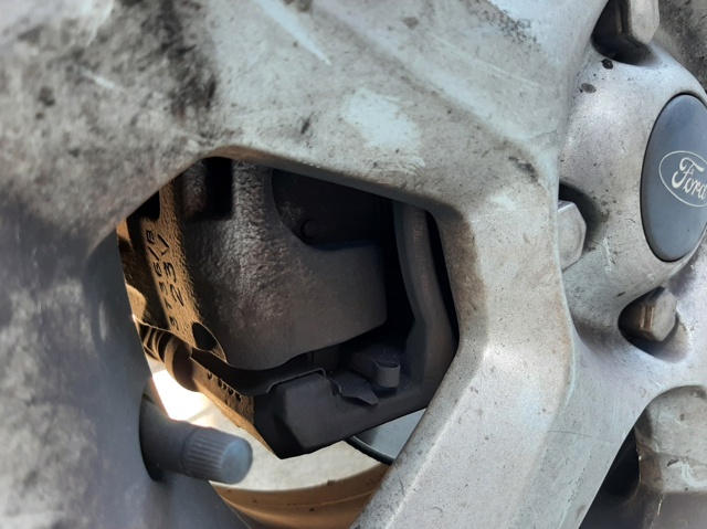 1766840 FORD Суппорт тормозной передний левый купить в Сумы