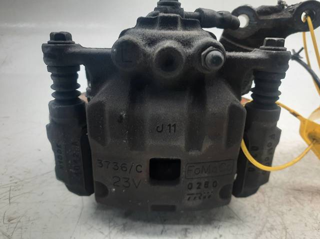 1766840 FORD Суппорт тормозной передний левый купить в Сумы