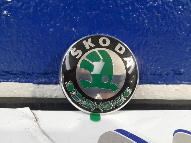 Emblema de grelha do radiador 1U0853621C VAG/Skoda