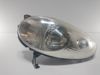 Luz esquerda 26060AX700 NISSAN