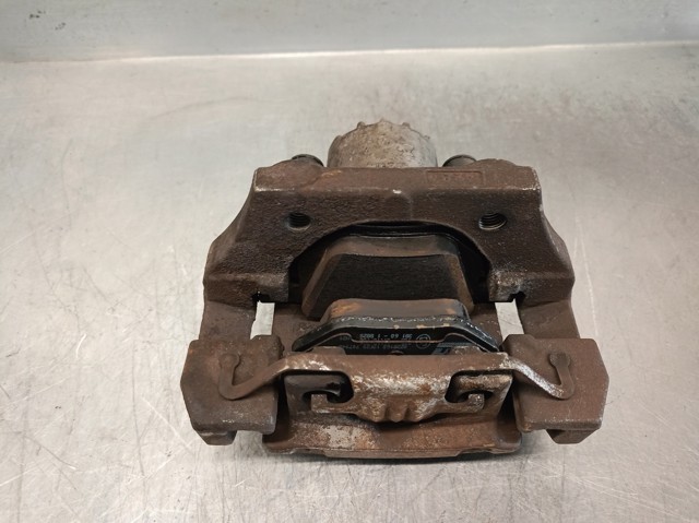 34216765909 BMW Суппорт задний левый купить в Львов