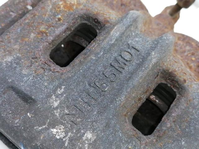 NISSAN 410014JA0B Суппорт тормозной передний правый в наличии Черкассы