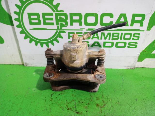 4100199B00 NISSAN Суппорт тормозной передний правый купить в Харьков