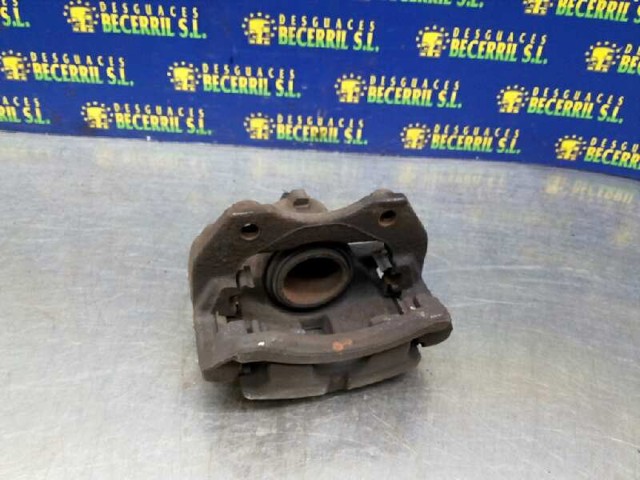 NISSAN 410114U10A Суппорт тормозной передний левый в наличии Ирпень