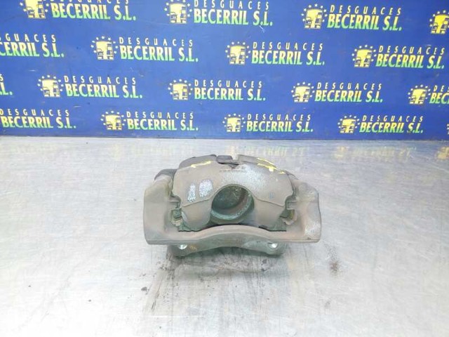 41011AX60A NISSAN Суппорт тормозной передний левый купить в Винница