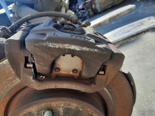 NISSAN 440114CA0B Суппорт задний левый в наличии Харьков