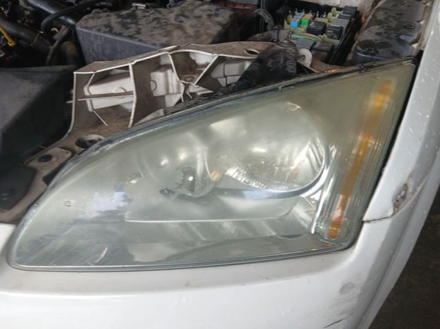 FORD 4M5113W030AD Левая фара в наличии Ровно