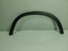 Expansor esquerdo (placa sobreposta) de arco do pára-lama traseiro 51772990171 BMW