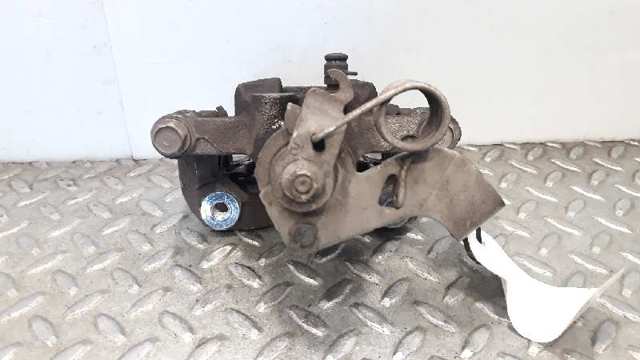 583001W350 HYUNDAI Суппорт тормозной задний левый купить в Киев