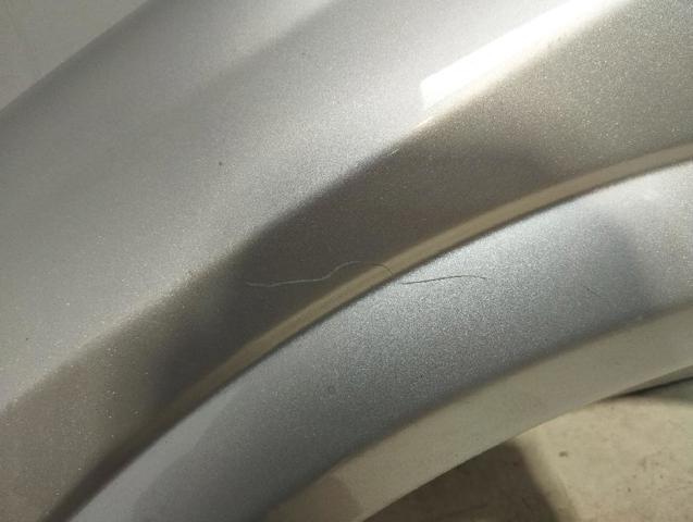 Pára-lama dianteiro esquerdo 6101327 OPEL