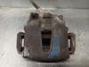 Suporte do freio dianteiro esquerdo 6189164 FORD